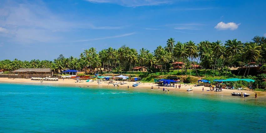 Lush green Goa beach during monsoon – showing which month is best to visit Goa
