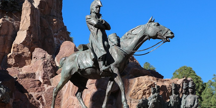 Monumento al Ejercito de los Andes, with multiple black statues on the rocky structure,is one of the popular monuments in Argentina.