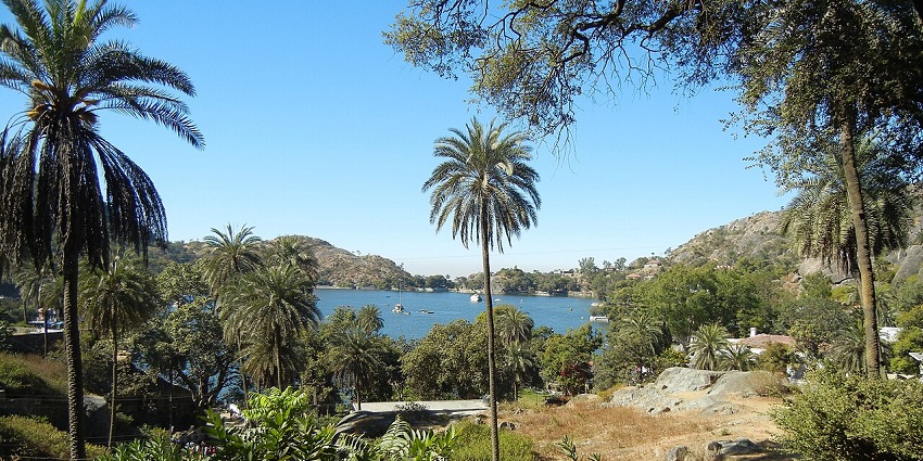 Mount Abu Wildlife Sanctuary with palm trees and Nakki Lake, one of the best places to visit in Mount Abu in April