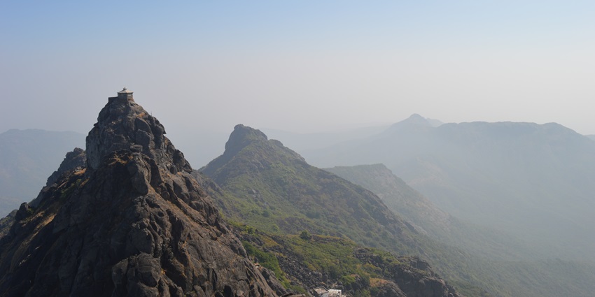 Ancient pilgrimage hill with thousands of steps and Jain and Hindu temples at its summit.