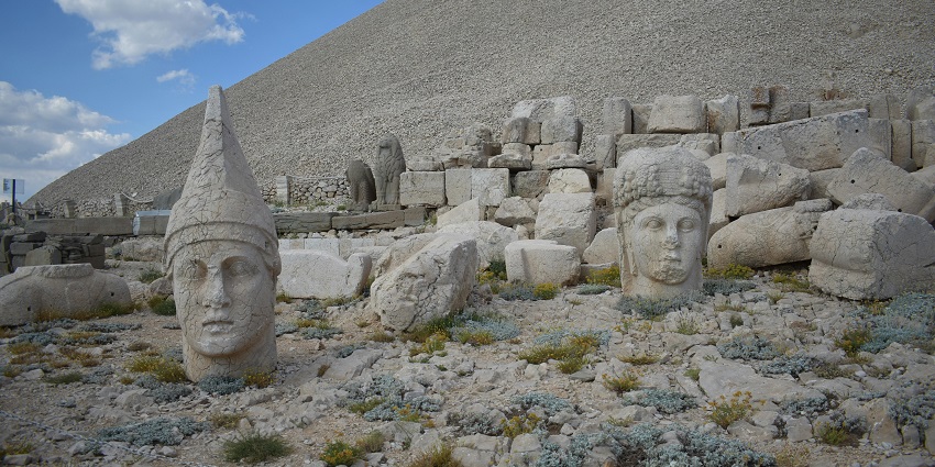 Giant stone heads atop Mount Nemrut, standing as silent guardians among Monuments in Turkey.