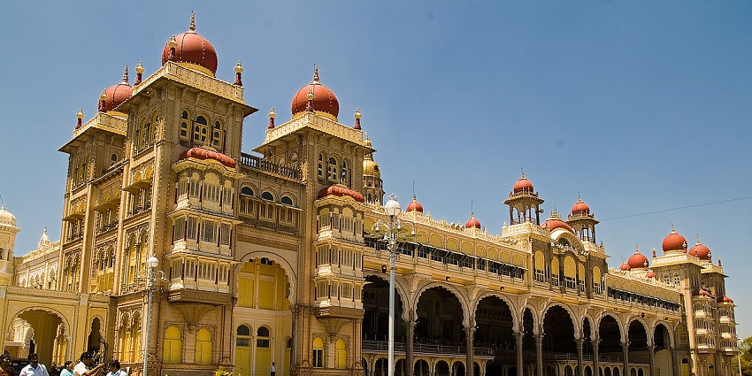 Illuminated Mysore Palace glowing at night, one of the royal places to visit near Bangalore within 3 days