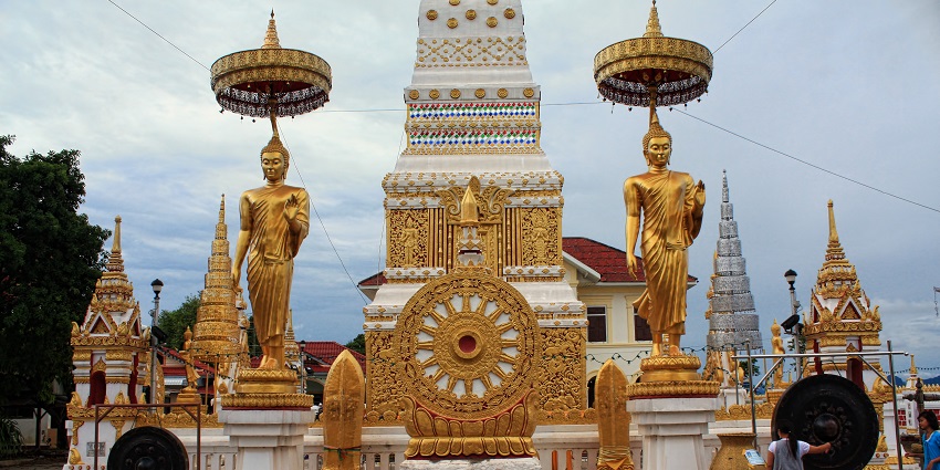 A scenic view of Nakhon Phanom province with golden statues of the Phra That, is one of the best places to visit in Thailand in July.