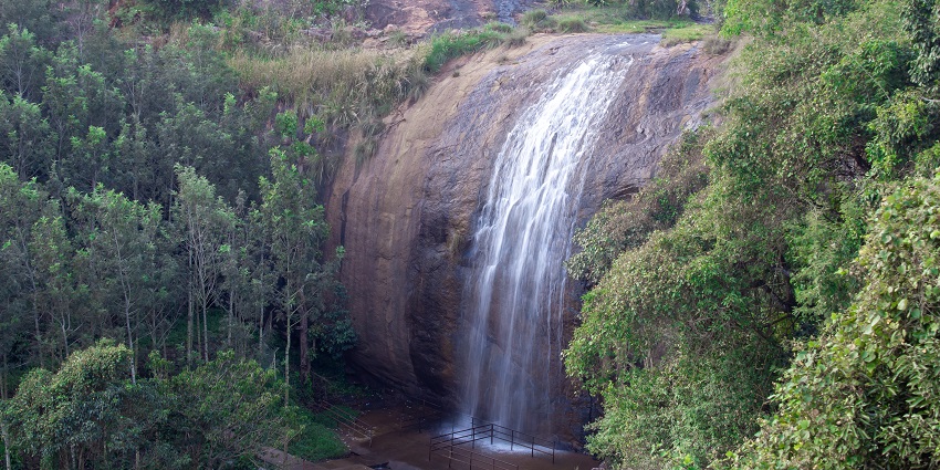 Kolli Hills, a scenic Eastern Ghats destination with 70 hairpin bends, ancient sites, waterfall, forests.