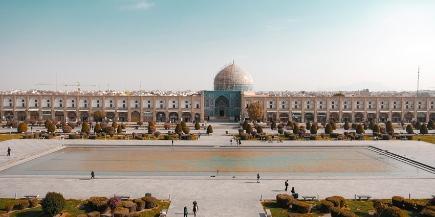 A wide view of Naqsh-e Jahan Square with historic domes, a key monument in Iran.