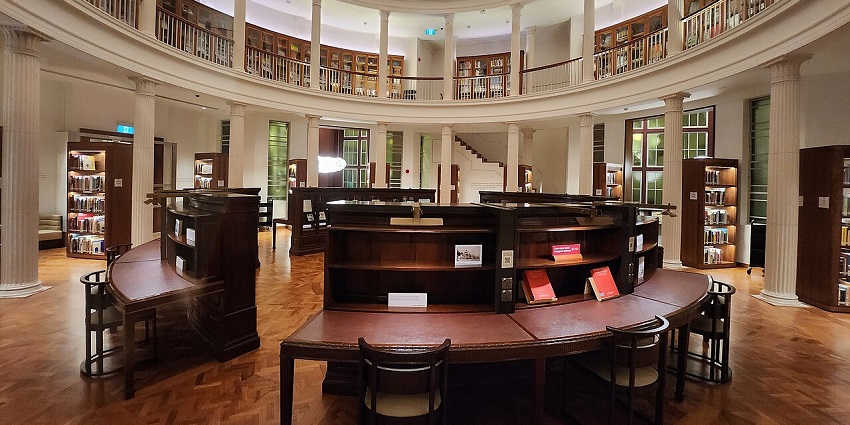 The interior view of the National Gallery, showing its architecture and many books, one of the best places to visit in Singapore in September.
