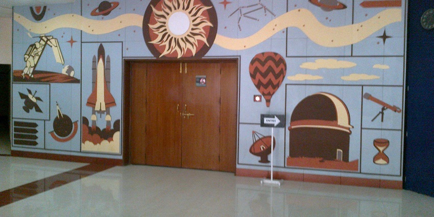 Image of the entrance to Nehru Planetarium with clear signage and surrounding architecture.
