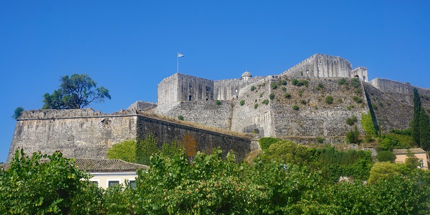 The ancient stone walls of the New Fortress of Corfu in Greece, one of the top historical places in Corfu.