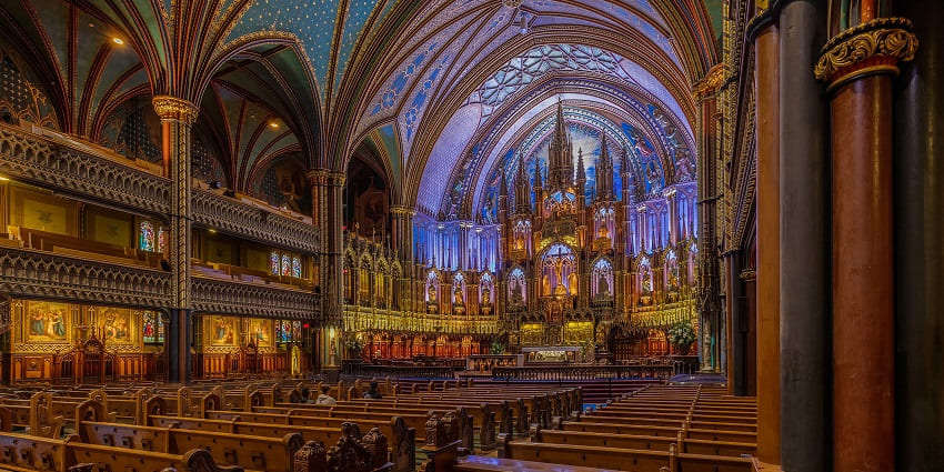 The ornate interior of Notre-Dame Basilica, Quebec, is a breathtaking monument in Canada.