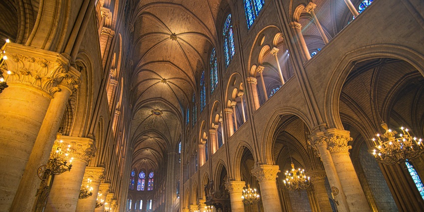 The Gothic facade of Notre-Dame Cathedral, one of the best monuments in Paris, France.