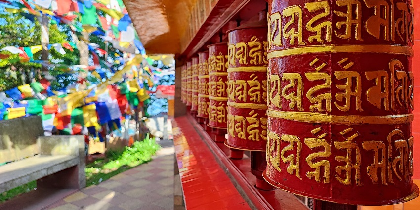 Mahakal temple on observatory hill, with the rolling scriptures and Tibetan praying flags, one of the places to visit in Darjeeling in May.