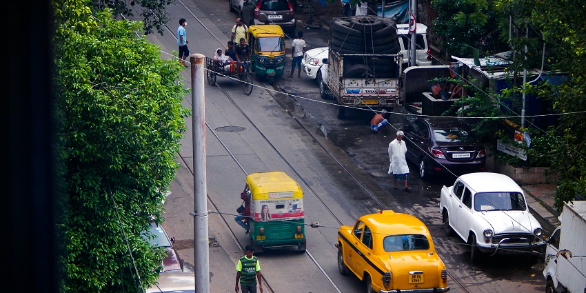 Colorful street view in Kolkata with traditional buildings