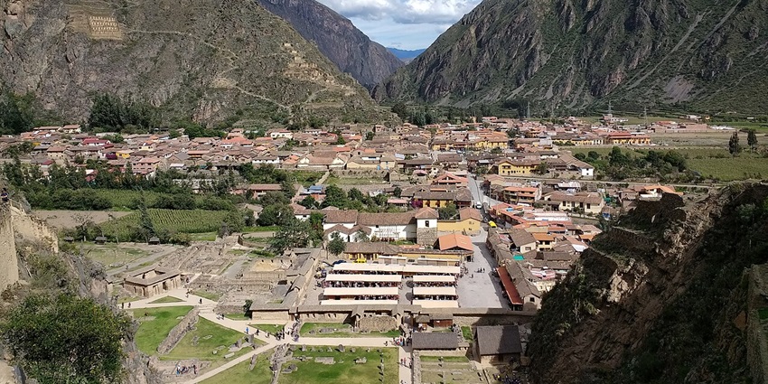 The ancient Inca town, surrounded by steep, rugged mountains, historical monument in Peru.