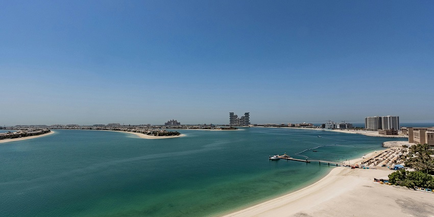 A scenic view of luxury developments on the man-made Palm Jumeirah, one of the iconic islands in the UAE.