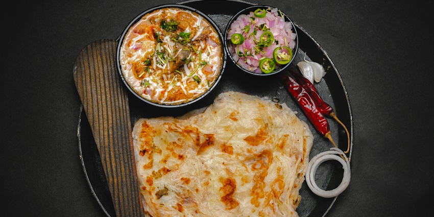 Stuffed North Indian paranthas served with pickles – what is famous in Delhi to eat