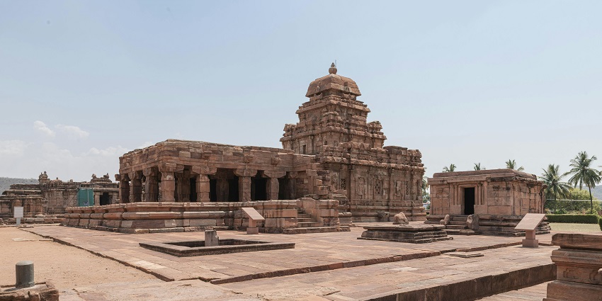 Parshuram Temple surrounded by trees with traditional architecture and a peaceful hillside setting.