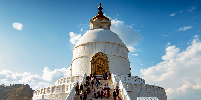 An image of a temple resembling the Pazhamudhir Solai, a famous Murugan temple in Madurai.