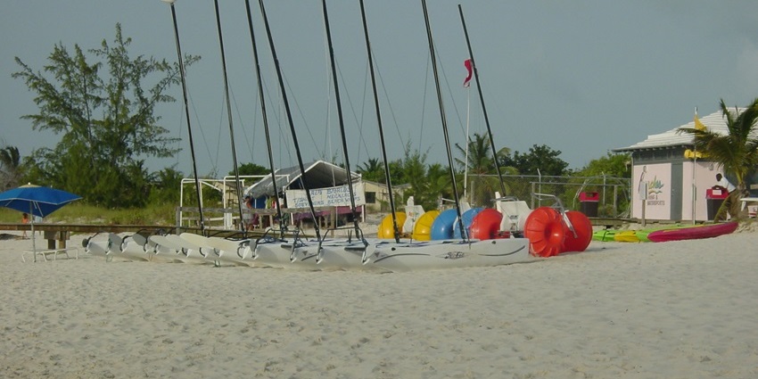Unwind at eco-resorts and snorkel through stunning barrier reefs off Pine Cay’s coast.
