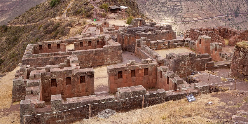 Pisac ruins from above in the Sacred Valley with old ruined architecture, one of the iconic historical places in Peru.