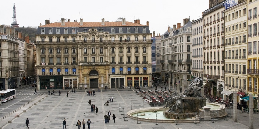 Place des Terreaux from the balcony of Hôtel de Ville with detailed architecture, one of the historical places in Lyon.