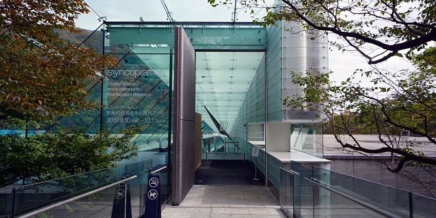 Explore a light-filled museum blending modern architecture with works by Monet and Renoir.
