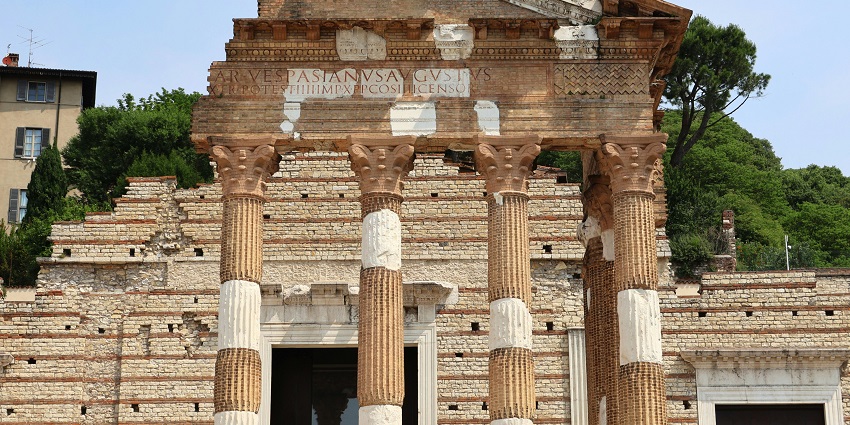 Temple of Venus in Pompeii Archaeological Park with ruins, broken stones.