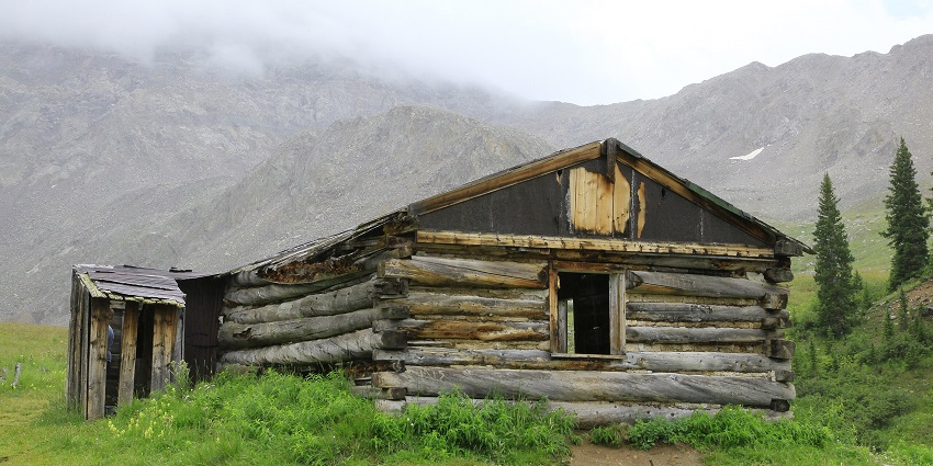 A view of an abandoned home on a cloudy day that looks quite spooky and scary in Australia.