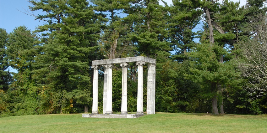 Open field with a monument marking the Princeton Battlefield, one of the popular historical places in NJ.