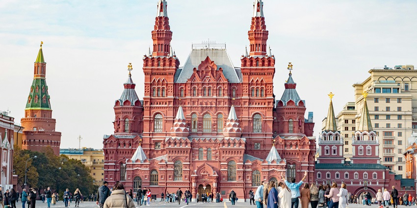 The Red Square, an iconic monument in Russia with its ornate red-brick facade and spires.