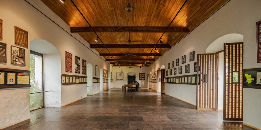 The interior hall of the Reis Magos Fort in Goa with unique lighting on the walls
