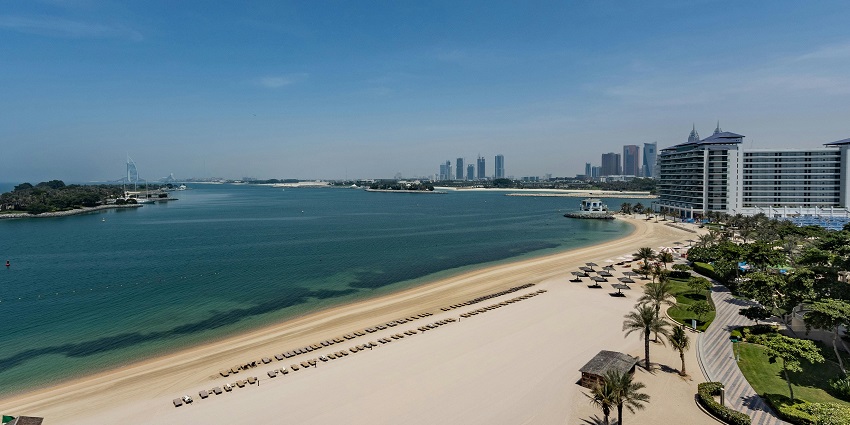 oft-sand beach with water sports, family zones, and a relaxed Dubai vibe.