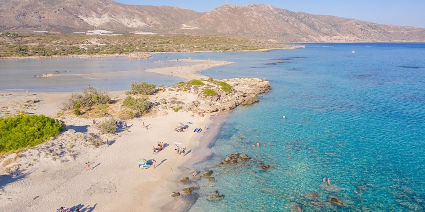 Unwind on the soft pink sands and swim in the shallow turquoise waters of Elafonissi Beach.