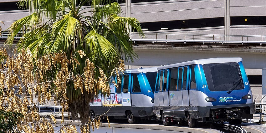 Elevated Metromover train gliding through Miami, one of the best things to do in downtown Miami at night.
