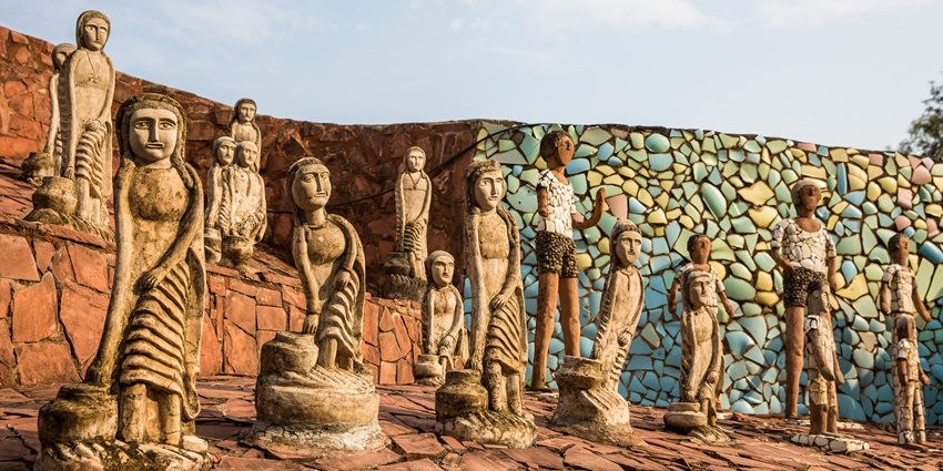 Creative sculptures made from industrial waste in Chandigarh's whimsical Rock Garden maze, among the best places to visit in Punjab in November.