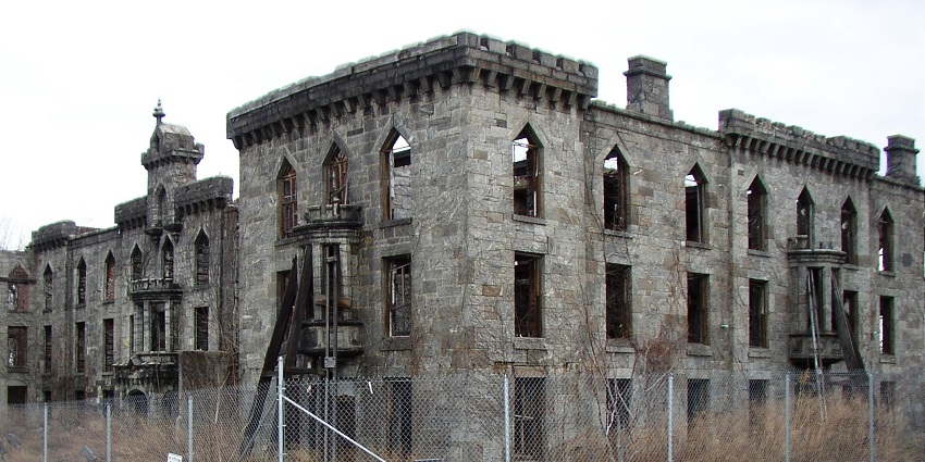 Roosevelt Island smallpox hospital ruins with broken stones and multiple windows