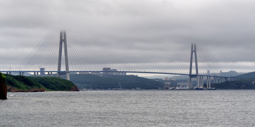 The Russky Bridge stretches to Russky Island with military history and scenic coastline.