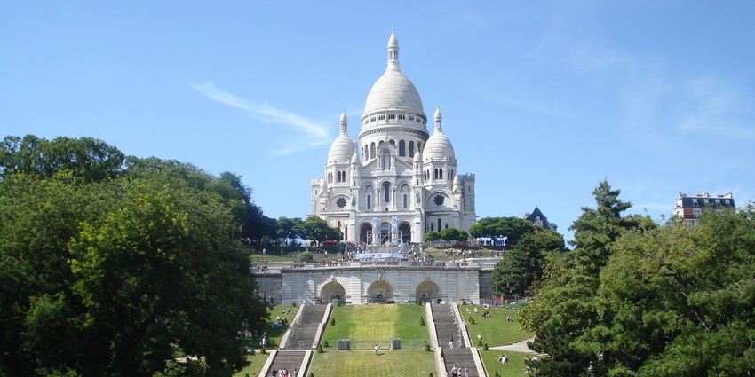 White-domed basilica overlooking Paris from Montmartre hill, monuments in France
