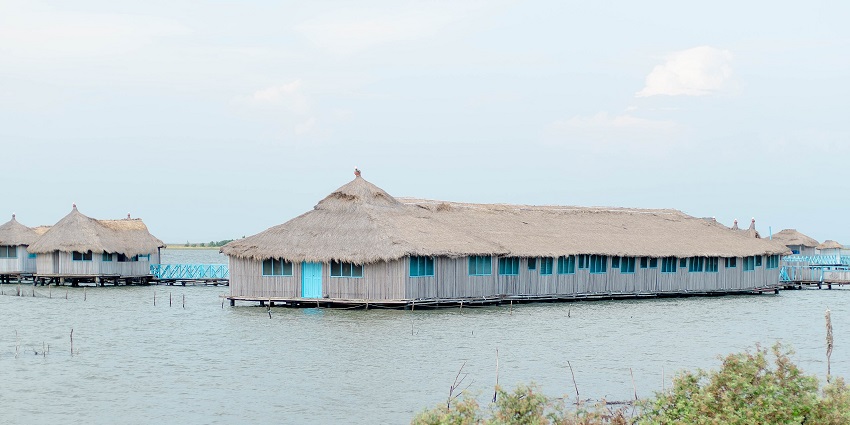 Sail through lagoons with birdlife and traditional coastal villages.