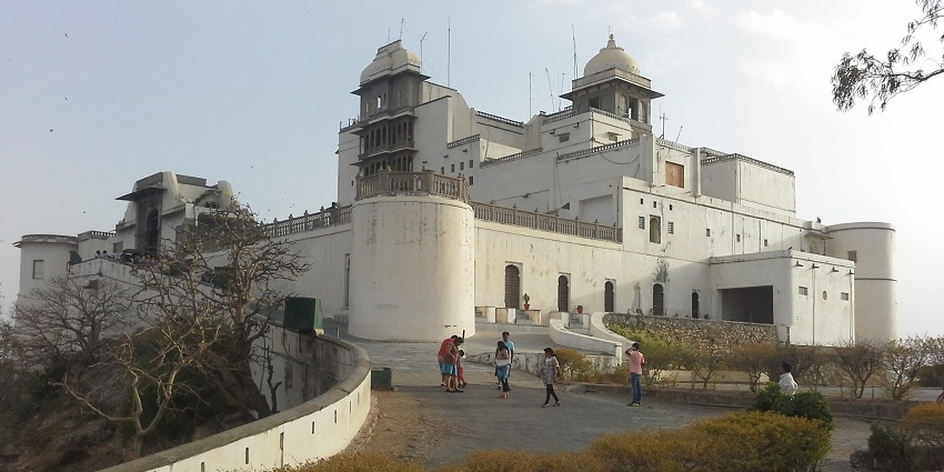 Cloud-kissed palace perched on a hilltop, perfect for watching sunsets and monsoon rains.