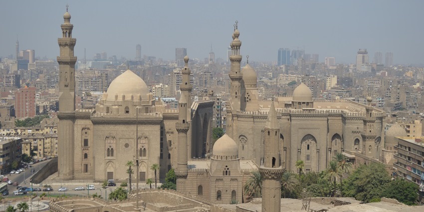 Panoramic view of the Saladin Citadel with minarets and domed structures, one of the best historical places in Cairo.