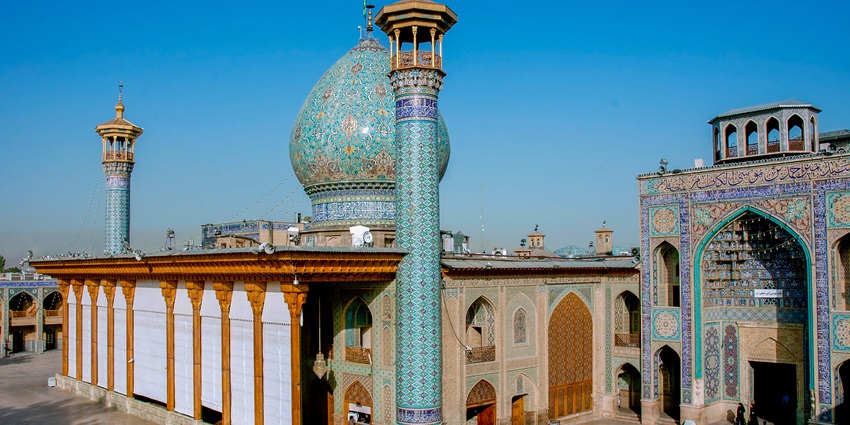 Shimmering chandeliers inside Shah Cheragh it is one of the famous monuments in Iran
