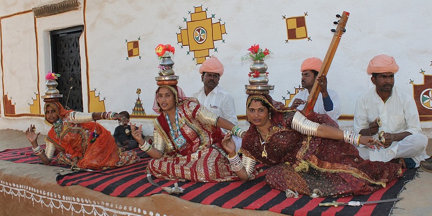 Cultural village with handmade crafts, tribal huts, and traditional music performances.