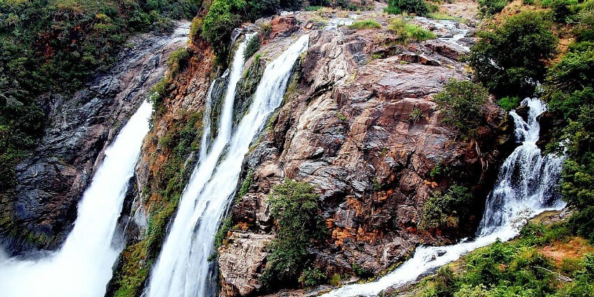 Powerful twin waterfalls crashing at Shivanasamudra, one among the best places to visit near Bangalore for 3 days.