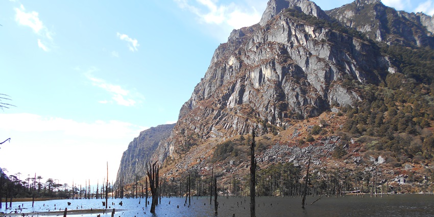 Sangestar Tso Lake with a still water body, one of the places to visit in Tawang