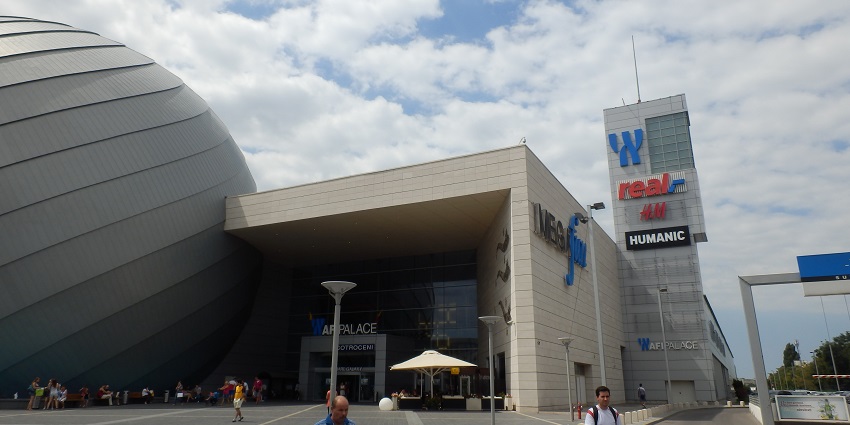 exploring modern retail stores and entertainment areas inside the AFI Cotroceni Mall.