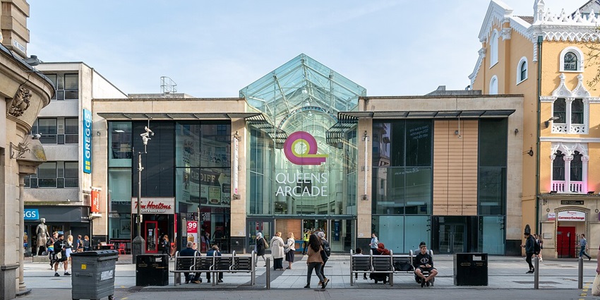 Queen Street entrance to the Queens Arcade shopping centre in Cardiff city centre, Wales.