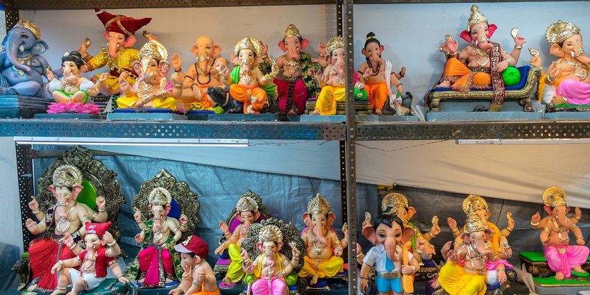 Beautiful god idols displayed in a shop—what is famous in Kolkata to buy.