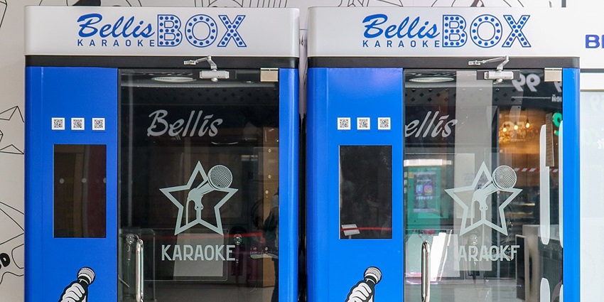Belt out your favorite songs in private karaoke rooms with neon lighting and full service