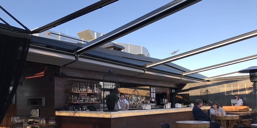 Things to do in Cannes in June include sipping cocktails and enjoying panoramic views over Cannes from an elegant rooftop bar