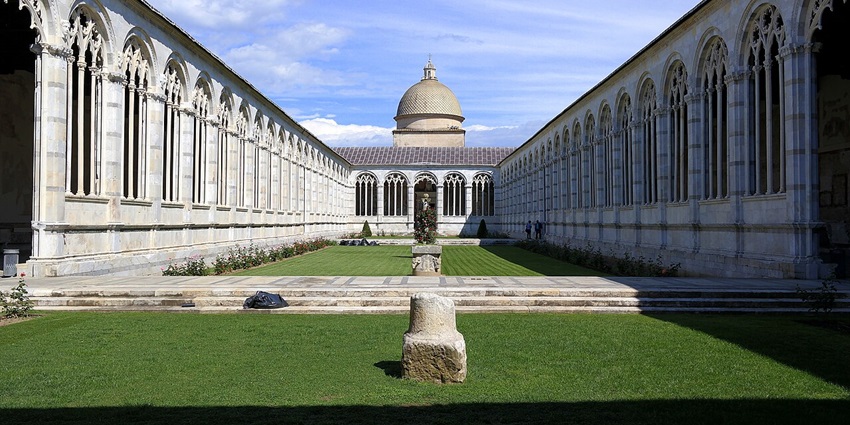The grand Camposanto Monumentale, showing its historic architecture and arched colonnades.